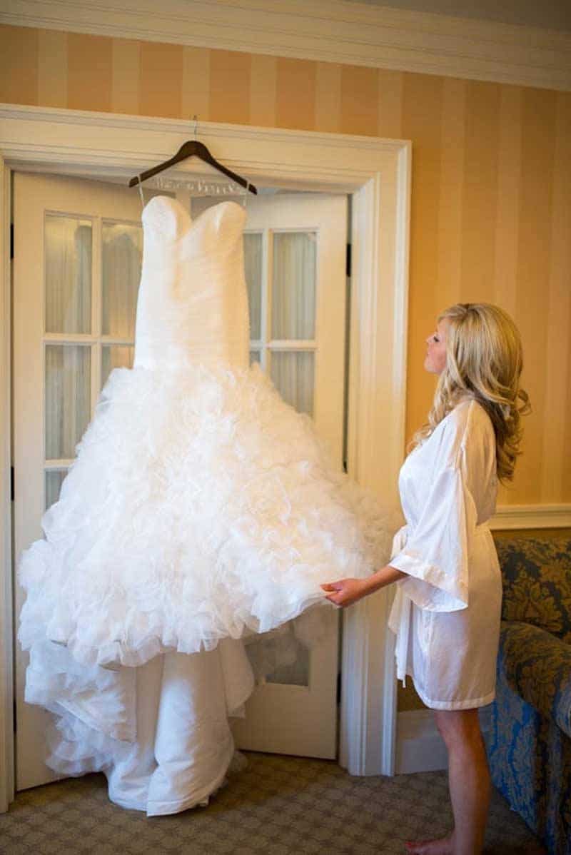 Bride Looking At Wedding Dress