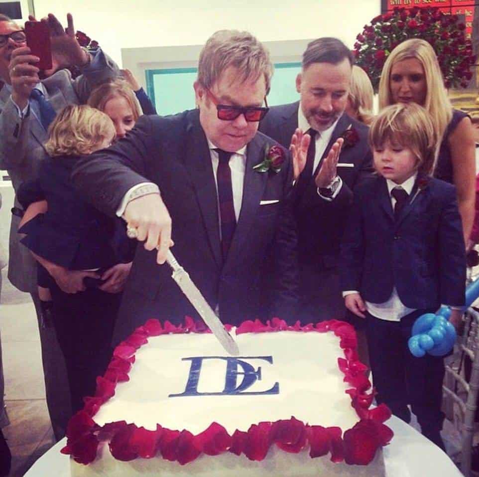 Sir Elton John Cutting His Wedding Cake