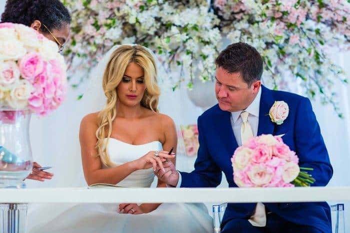 Bride and Groom Signing At Wedding Bride and Groom Signing At Wedding