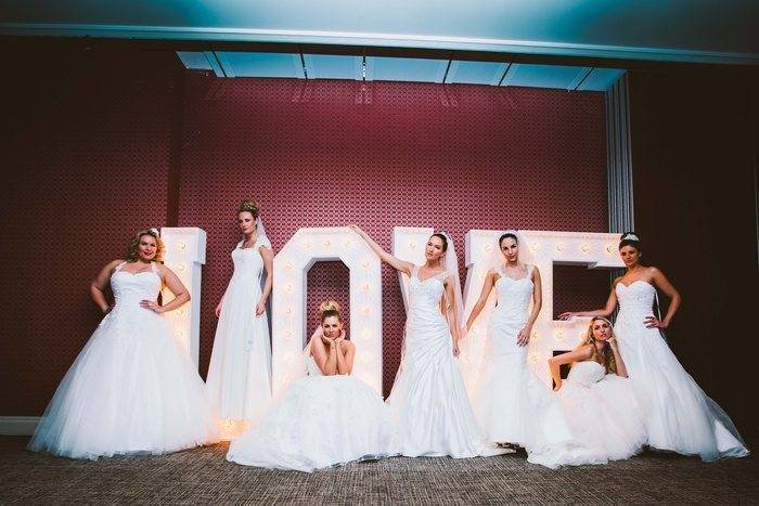 Brides with Love Sign From Amanda Wyatt
