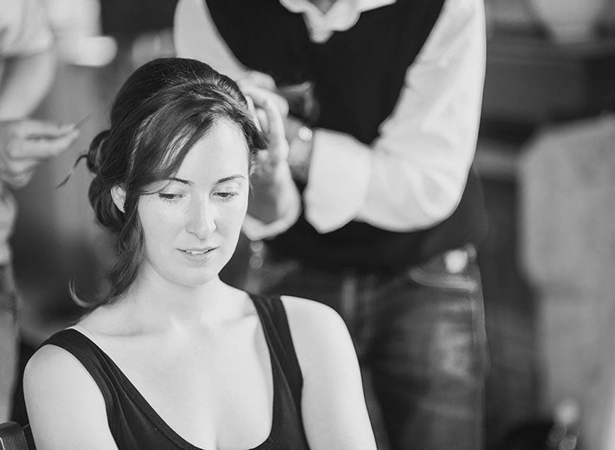 The bride prepares! Jodi’s hair is held up in a loose chignon at the side The bride prepares! Jodi’s hair is held up in a loose chignon at the side