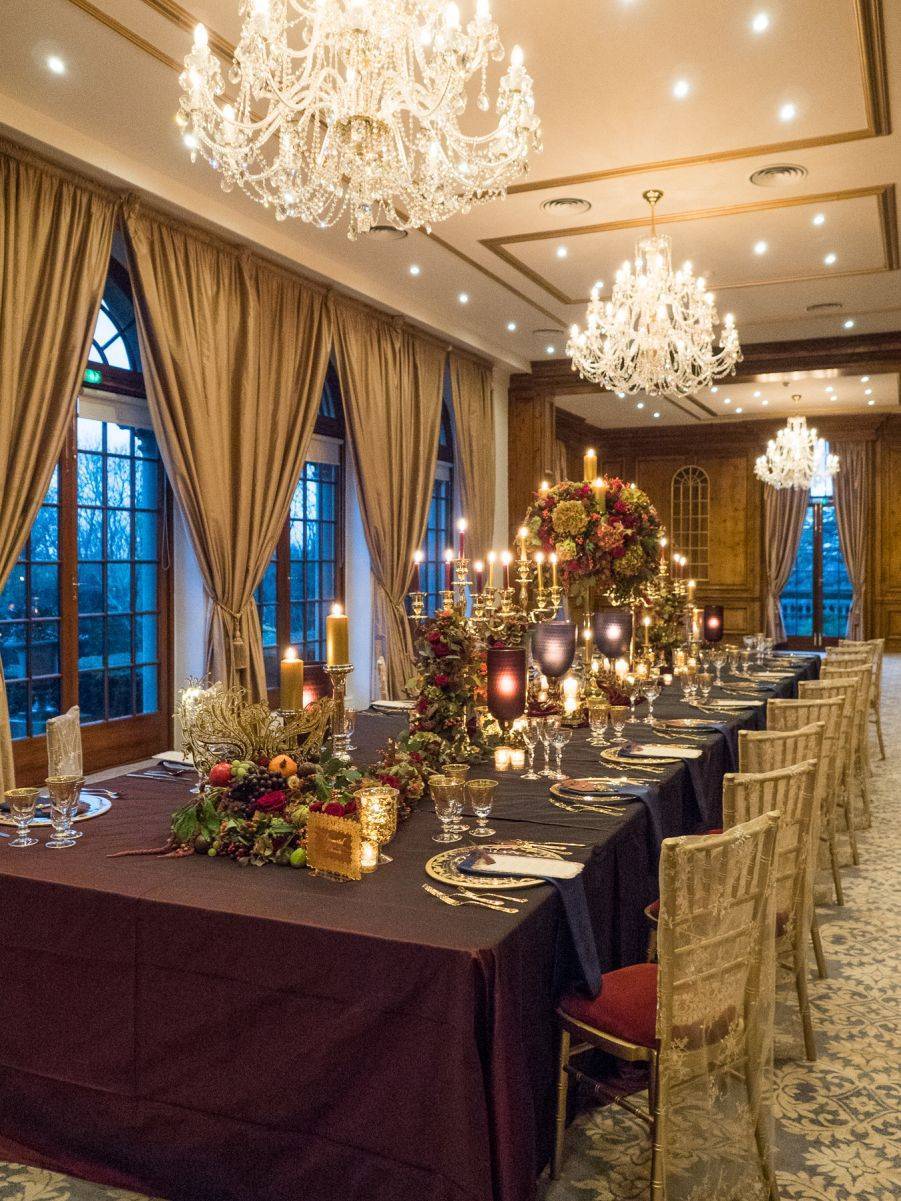 A festive feast at Hedsor House Soft candlelight and sparkling chandeliers illuminate the luscious blooms