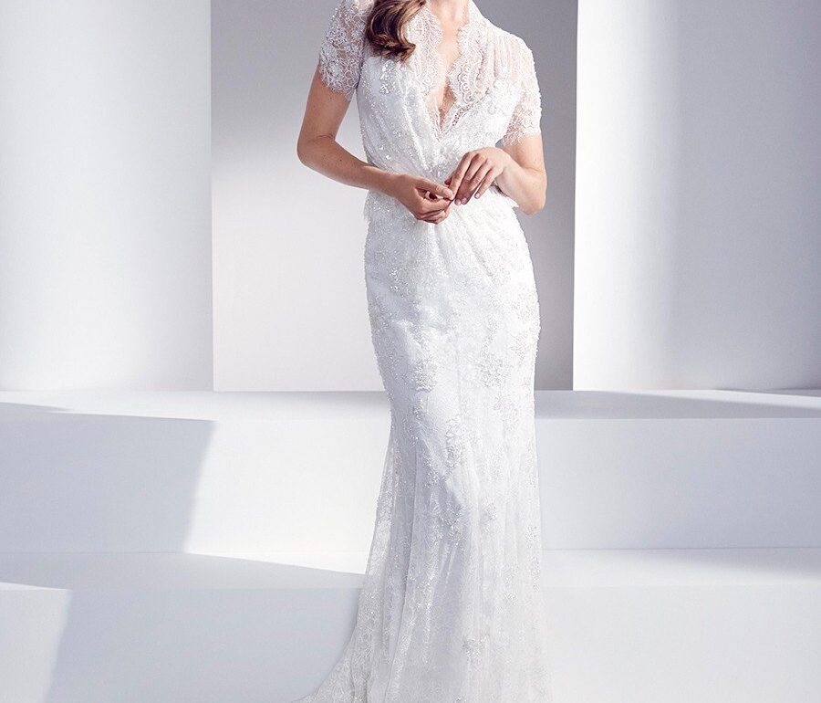 Elegant bridal lace gown with cap sleeves