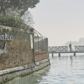 San Clemente Palace Venice canal view with couple