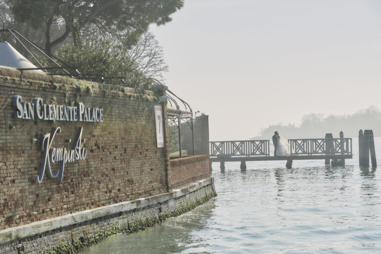 San Clemente Palace Venice canal view with couple