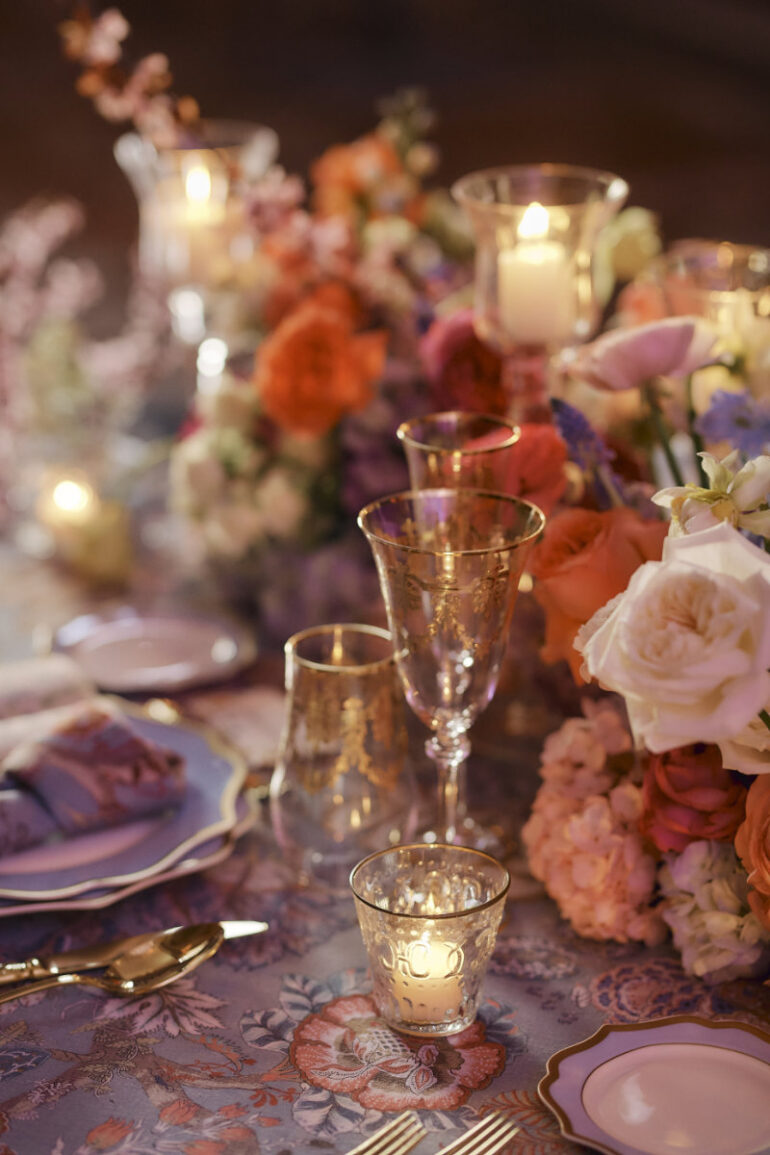 Elegant table setting with flowers and candles.