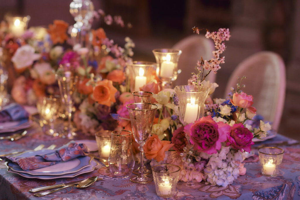 A Vision Of Venice From An International Team Of Creatives Elegant dinner table with flowers and candles.