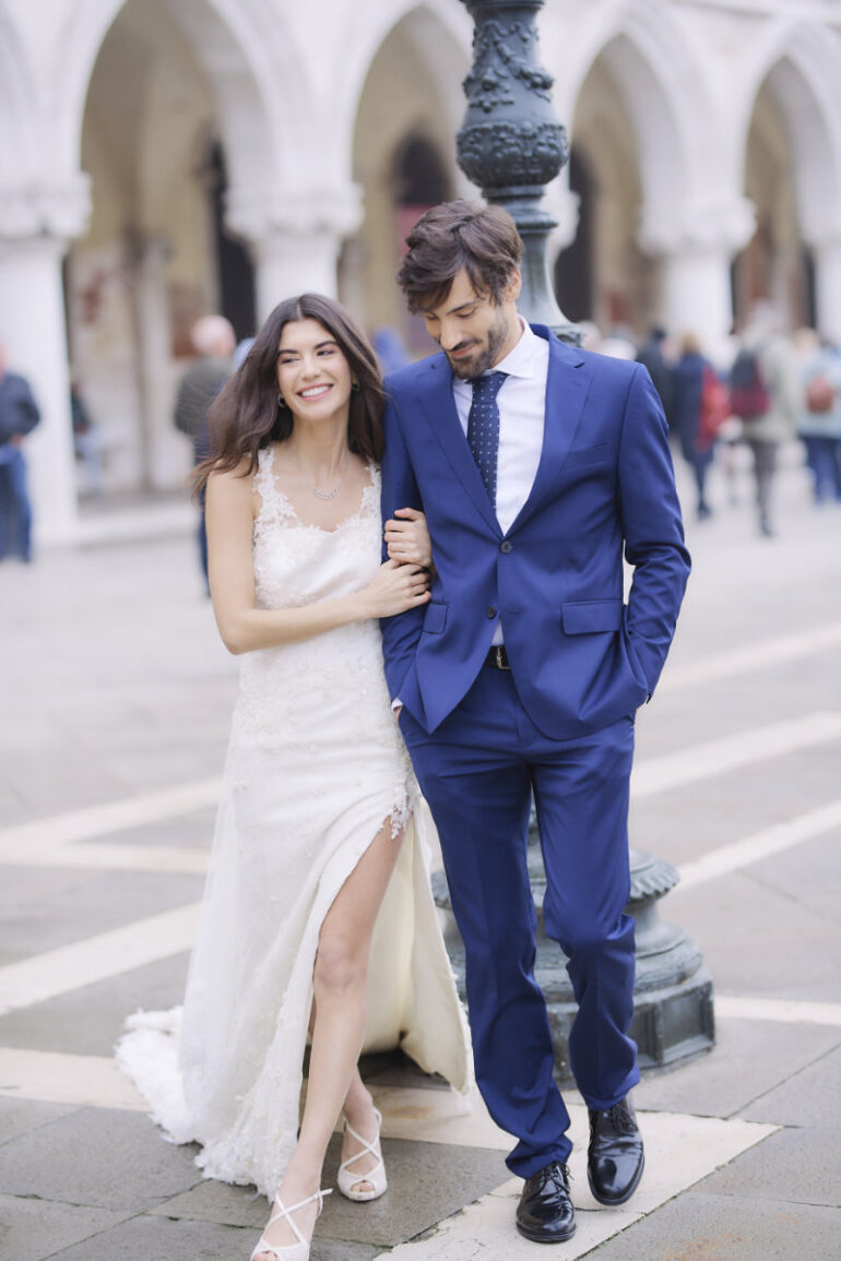 Bride and groom walking, outdoor background