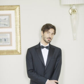 Man in black tuxedo and bow tie