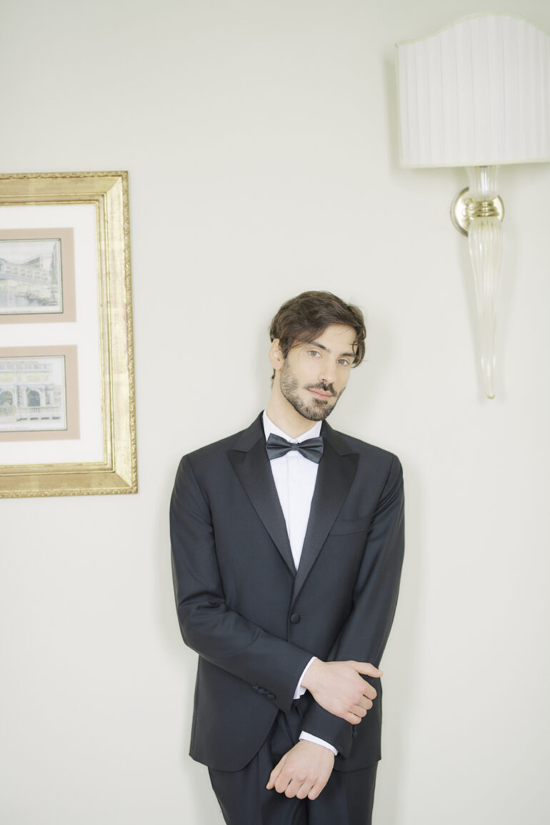 Man in black tuxedo and bow tie