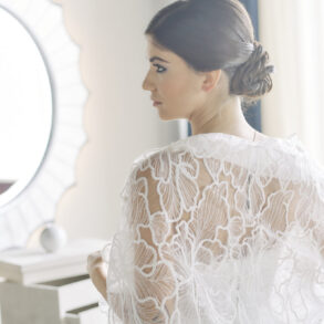 Bride in intricate white lace dress