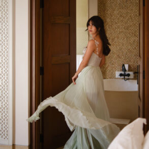 Woman twirling in a flowing dress