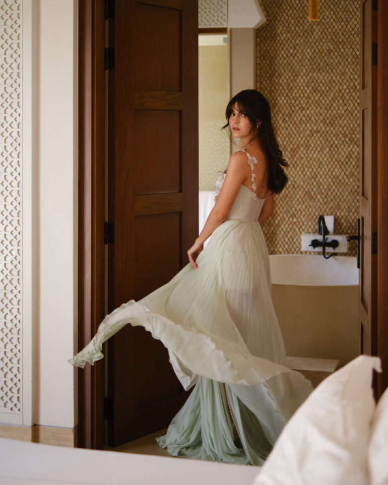 Woman twirling in a flowing dress