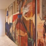 Abstract hallway mural in modern building