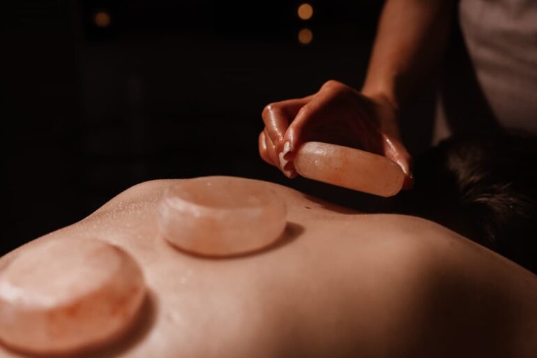 Hot stone massage on back for relaxation