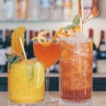 Assorted colourful cocktails on bar counter