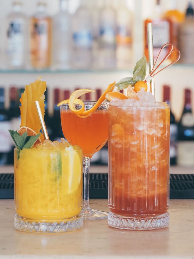 Assorted colourful cocktails on bar counter