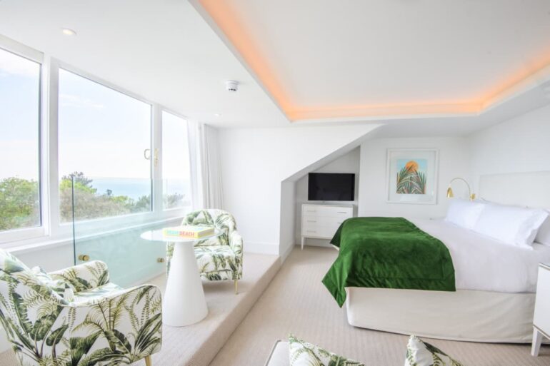 Bright coastal hotel room with sea view