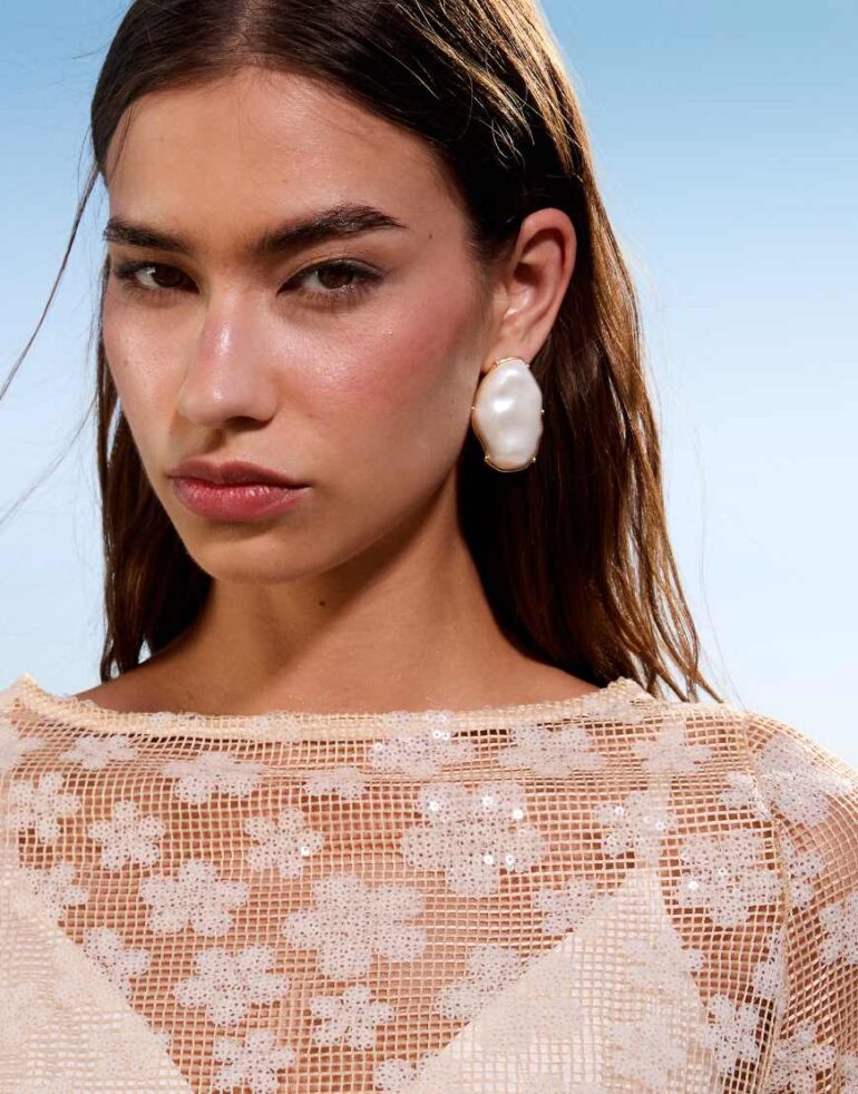 ASOS DESIGN stud earrings with faux pearl design in gold tone
