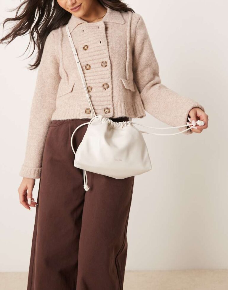 Calvin Klein Jeans drawstring crossbody bag in off white