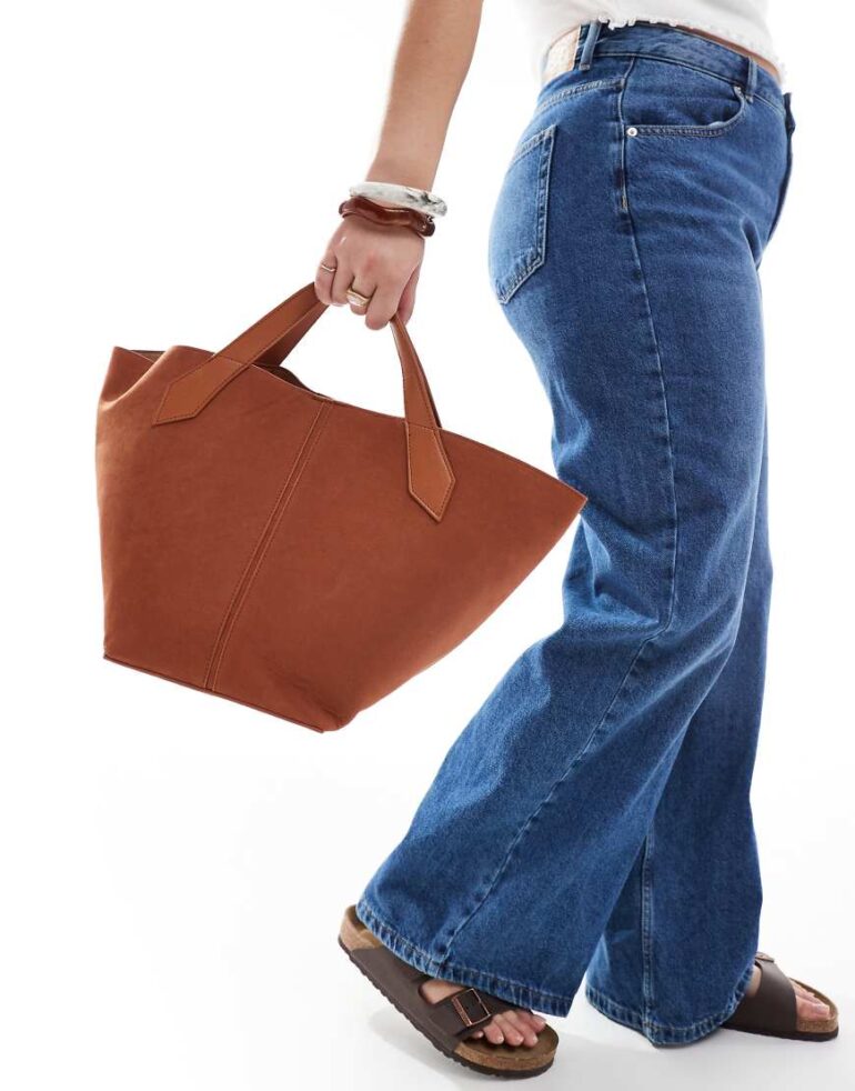 Glamorous faux suede top handle bag with crossbody strap in brown