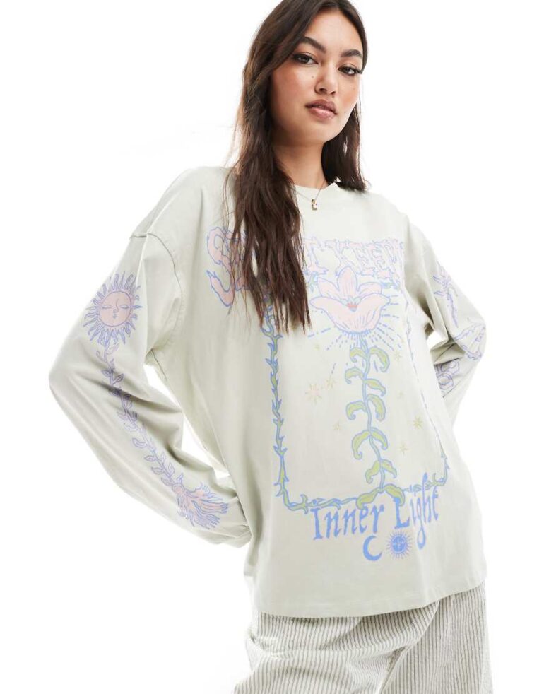 Monki oversized long sleeve t-shirt with 'spirit keeper' print in light green