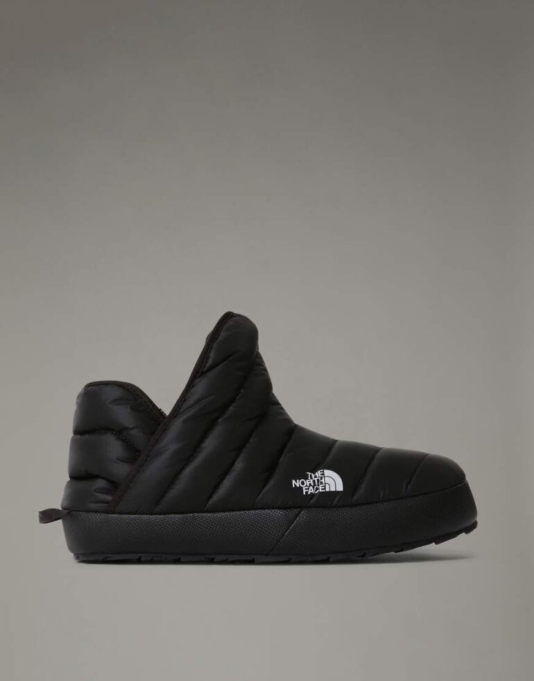 The North Face thermoball traction boots in black and white
