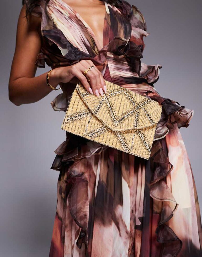 True Decadence beaded envelope clutch with crossbody strap in gold