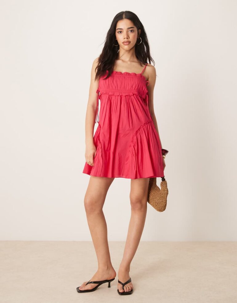 ASOS DESIGN babydoll mini dress with ruffle hem in raspberry-Pink