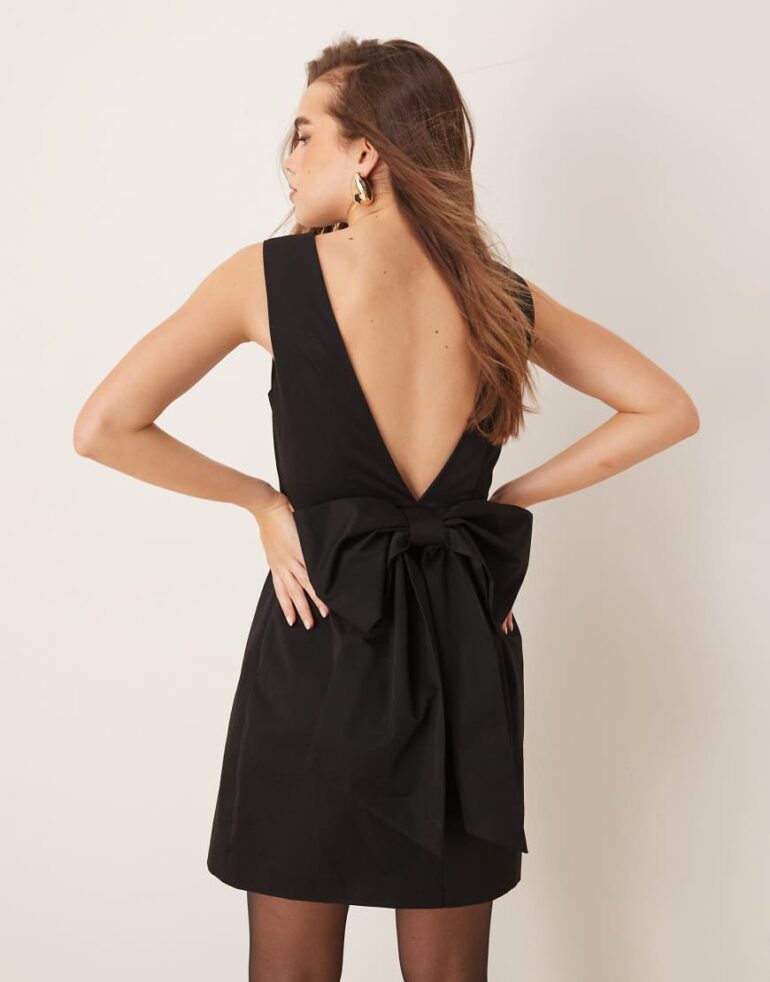 Gina Tricot mini dress with low v back and oversized bow detail at back in black
