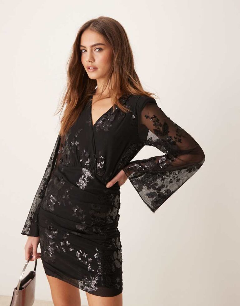 Gina Tricot mini dress with wrap front in black with textured shimmer jacquard floral pattern