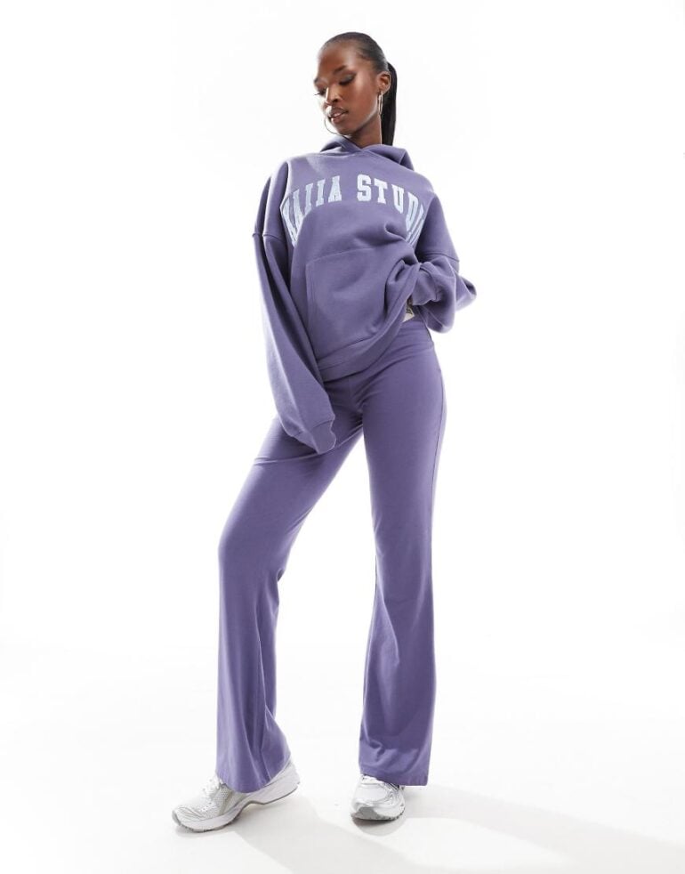 Kaiia exclusive Studio logo flared yoga pants co-ord in blue