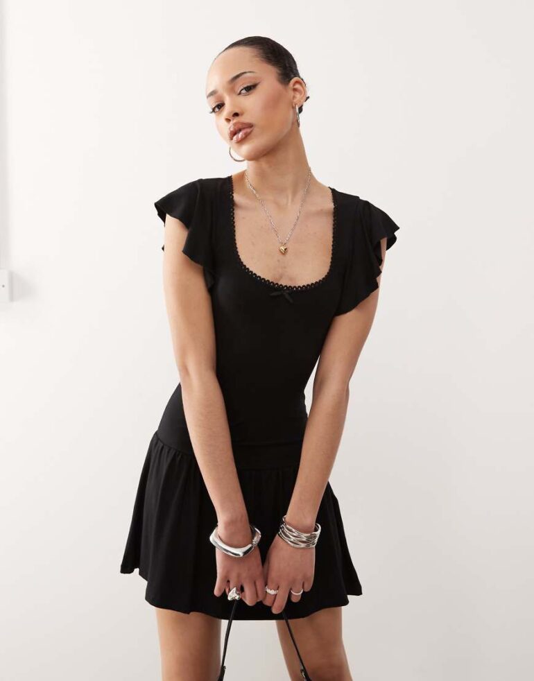 Motel Toinette drop waist mini dress in black