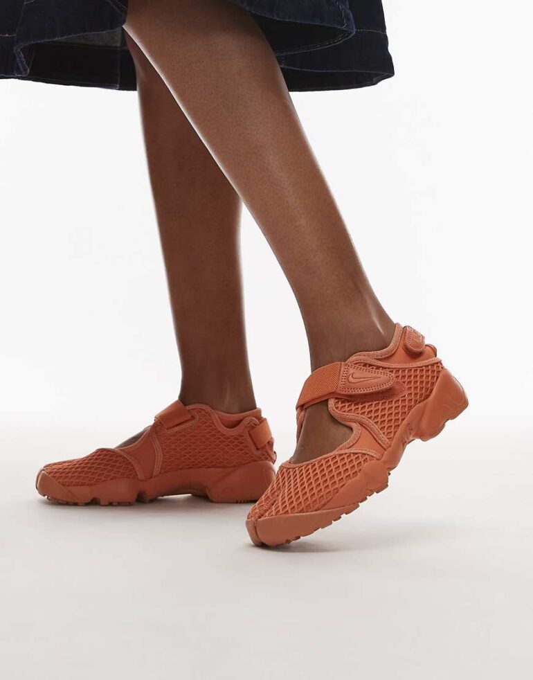 Nike Air Rift trainers in orange