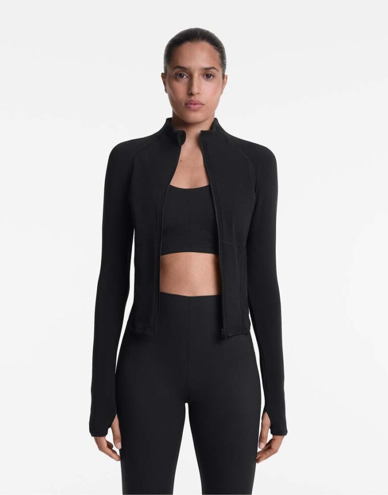 Oysho Light warm jacket with seams in black
