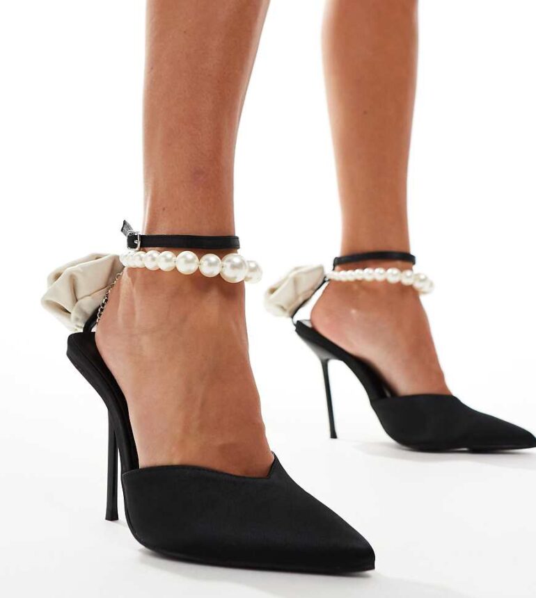 Public Desire Sariah Wide Fit pointed heels in black with pearl ankle strap and corsage detail