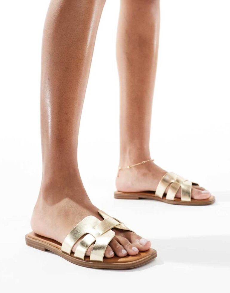 SEQWL Stork flat sandals in gold
