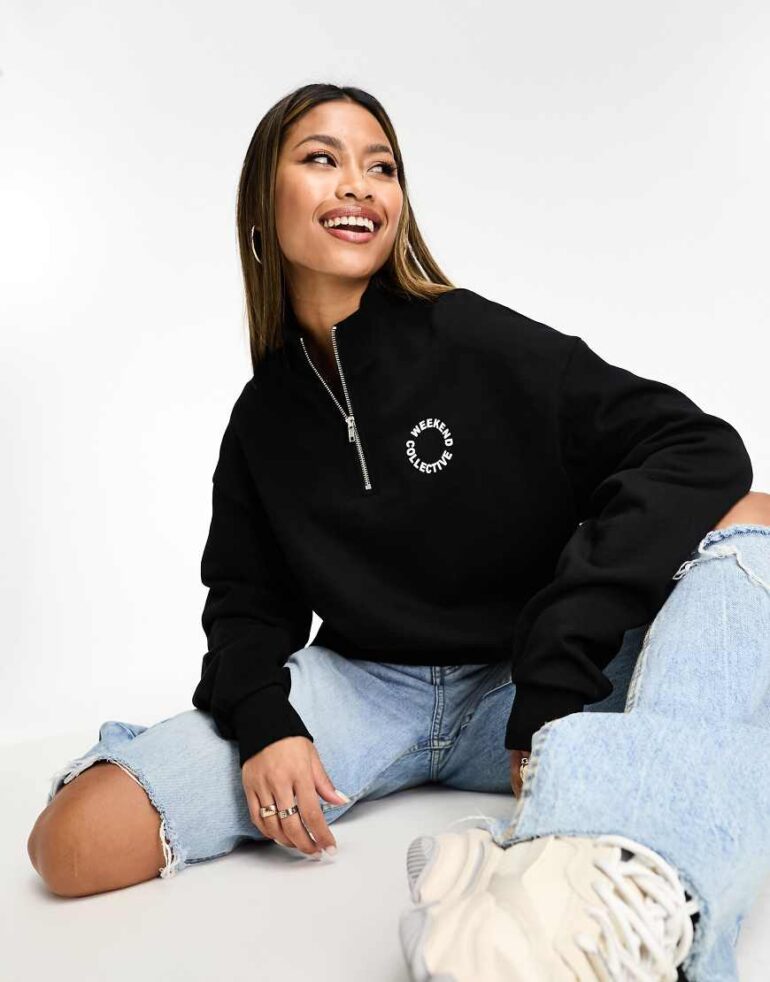 Weekend Collective half zip sweat with circle logo in black