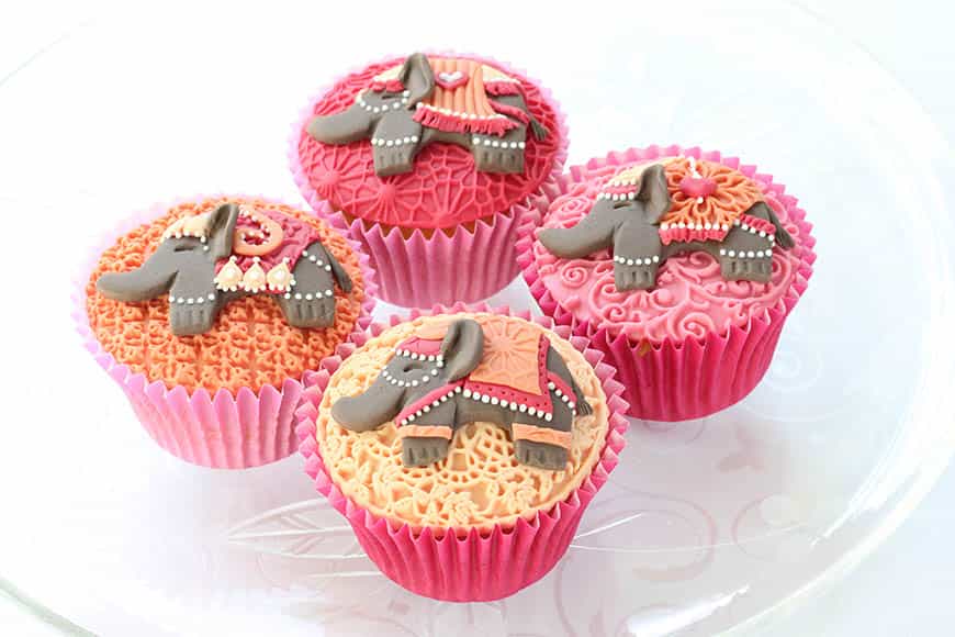 Bespoke Asian elephant wedding cupcakes in pinks and oranges Bespoke Asian elephant wedding cupcakes in pinks and oranges