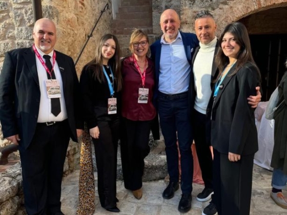 Friendly gathering of six individuals at an event