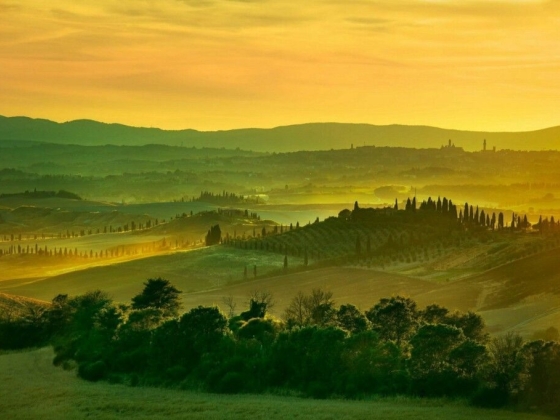 Breathtaking view of rolling hills at dusk.