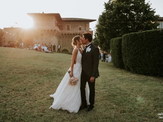A romantic moment between a couple on their wedding day.