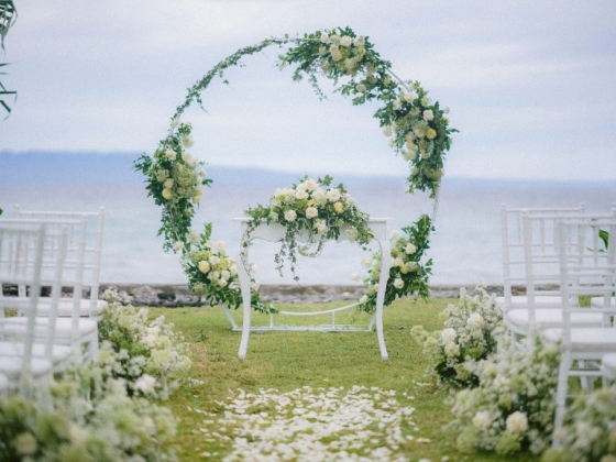 A beautiful outdoor wedding setup overlooking the ocean.