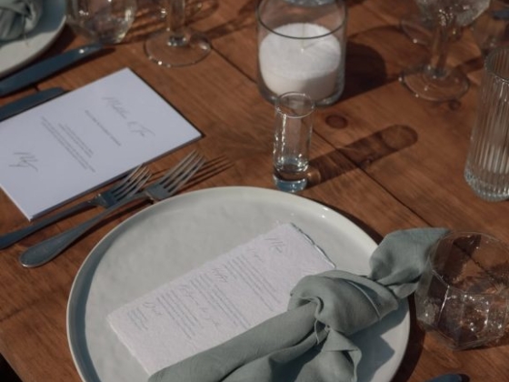 A beautifully arranged dining table ready for a meal.