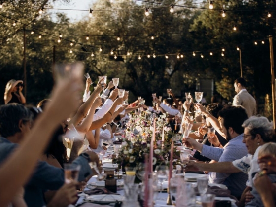 Celebration at a beautifully decorated long table.