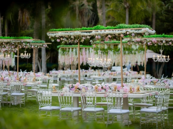 A beautifully set garden dining area for a wedding.