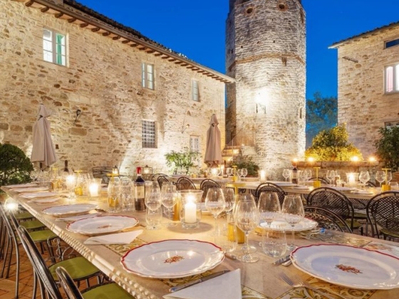 A beautifully set table for dining under twilight.