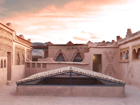 View of a courtyard with ornate buildings.