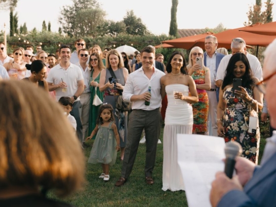 Celebration with guests enjoying a sunny evening.