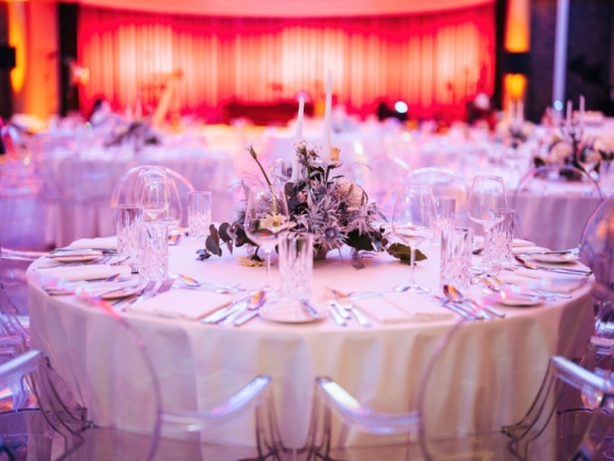 A beautifully arranged dining table for an event.
